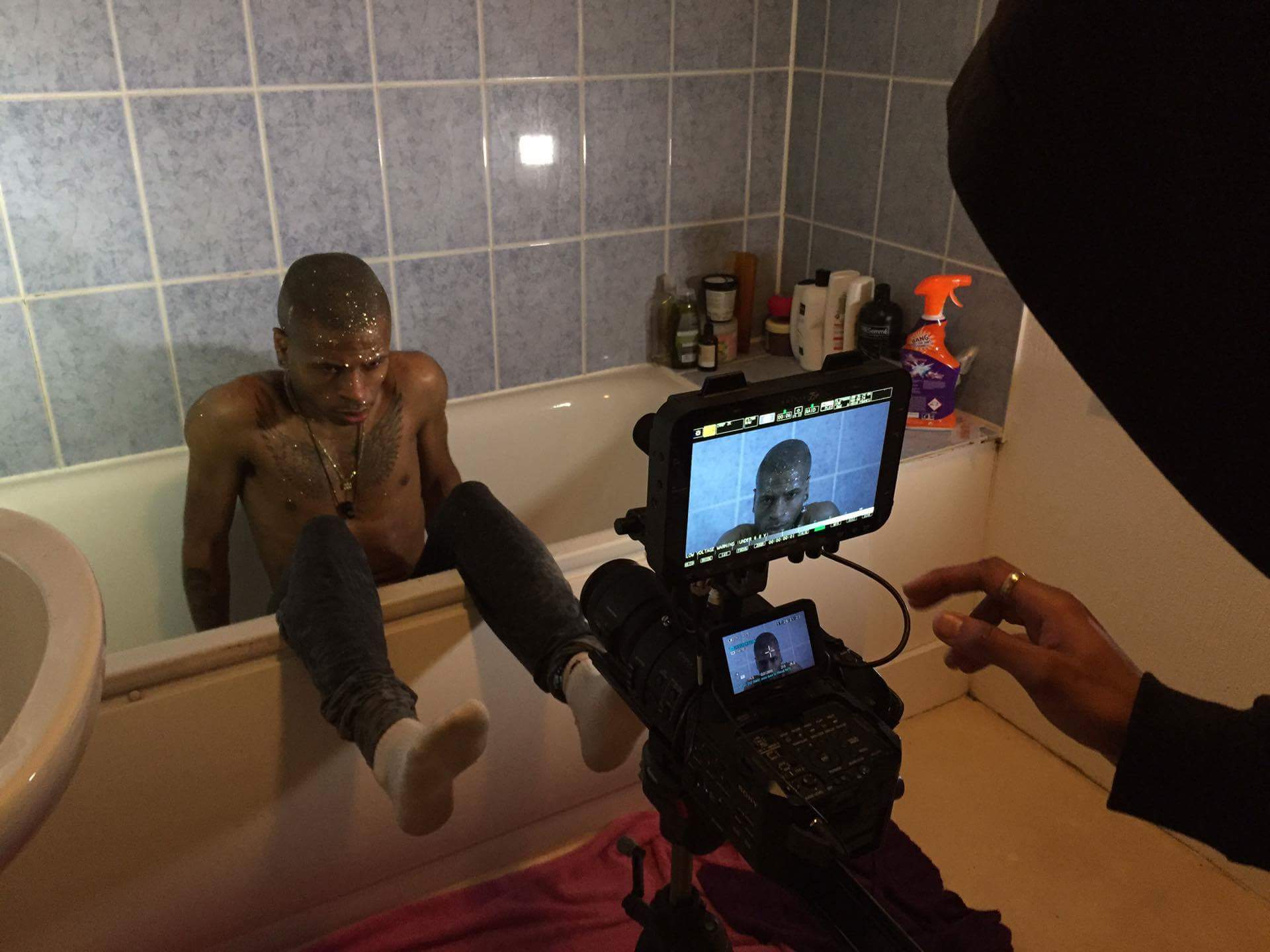 Behind the camera view during intimate filming session